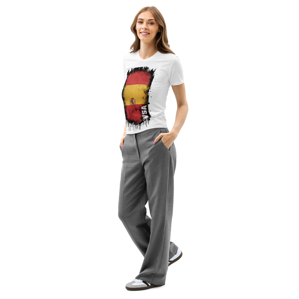 Woman wearing a white t-shirt with a colorful design and gray pants on a white background