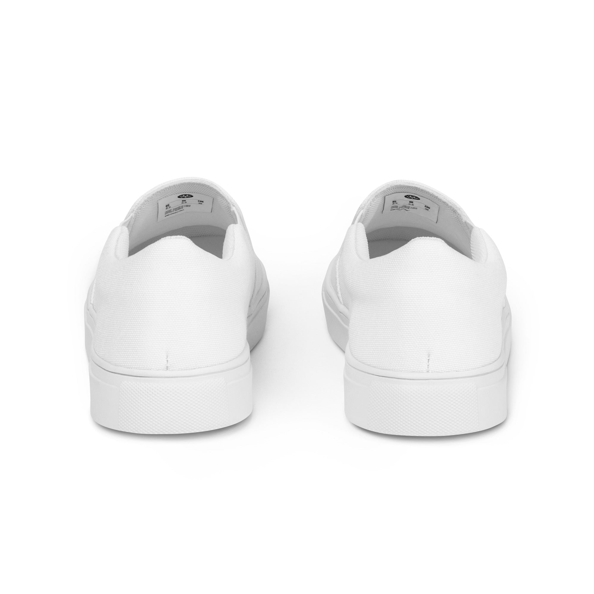 White sneakers shown from a top-down perspective on a white background