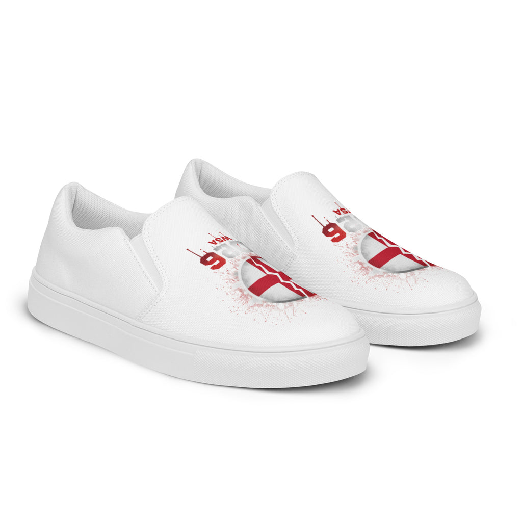 White slip-on sneakers with red and black designs on a white background
