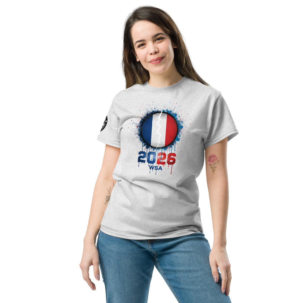 Woman wearing a gray t-shirt with a design featuring France's flag and '2026 WSA' text on a white background