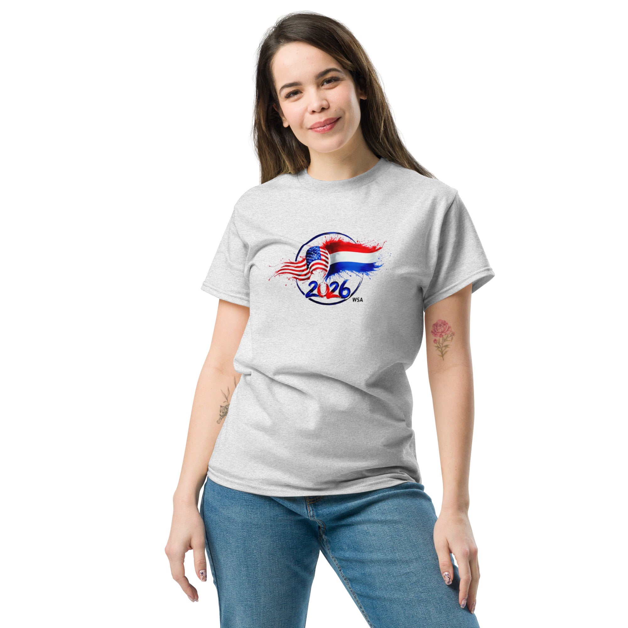 Woman wearing a gray t-shirt with a graphic design on a white background