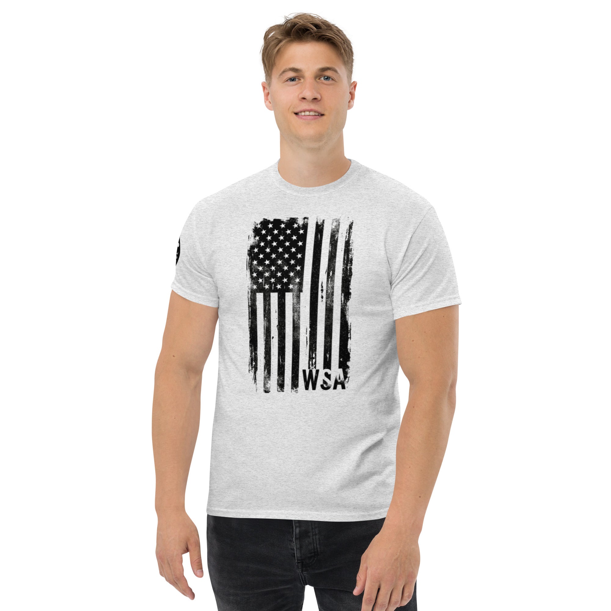 Man wearing a gray t-shirt with an American flag design on a white background