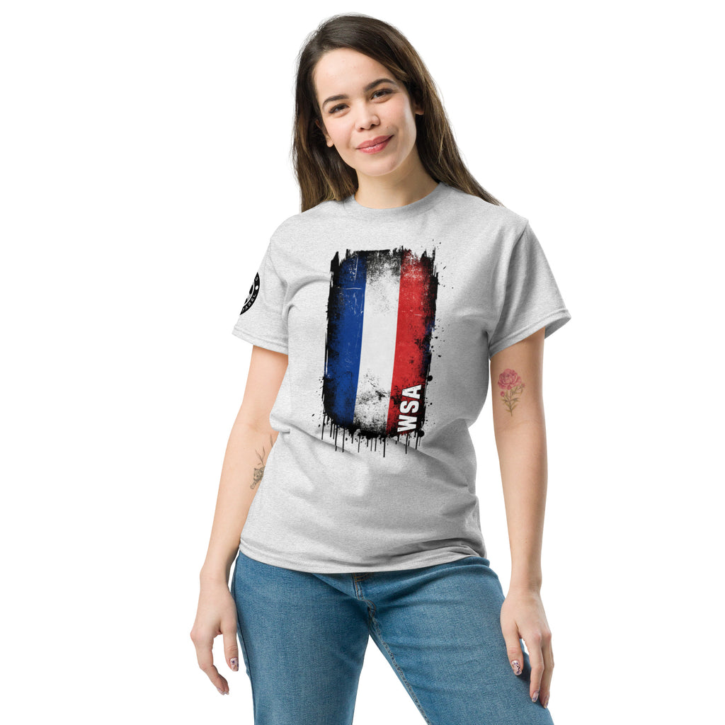 Woman wearing a gray t-shirt with a colorful graphic design on a white background