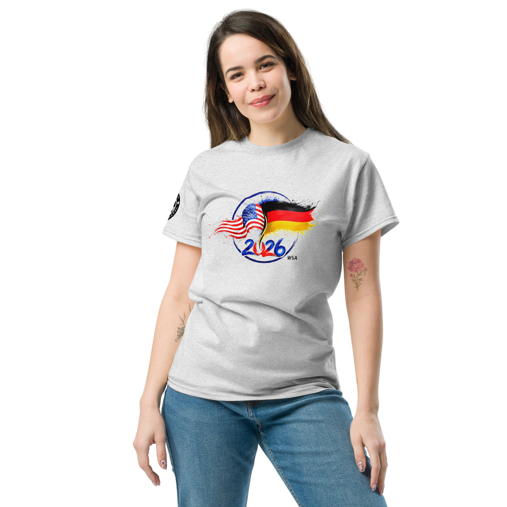 Woman wearing a gray t-shirt with a graphic design on a white background