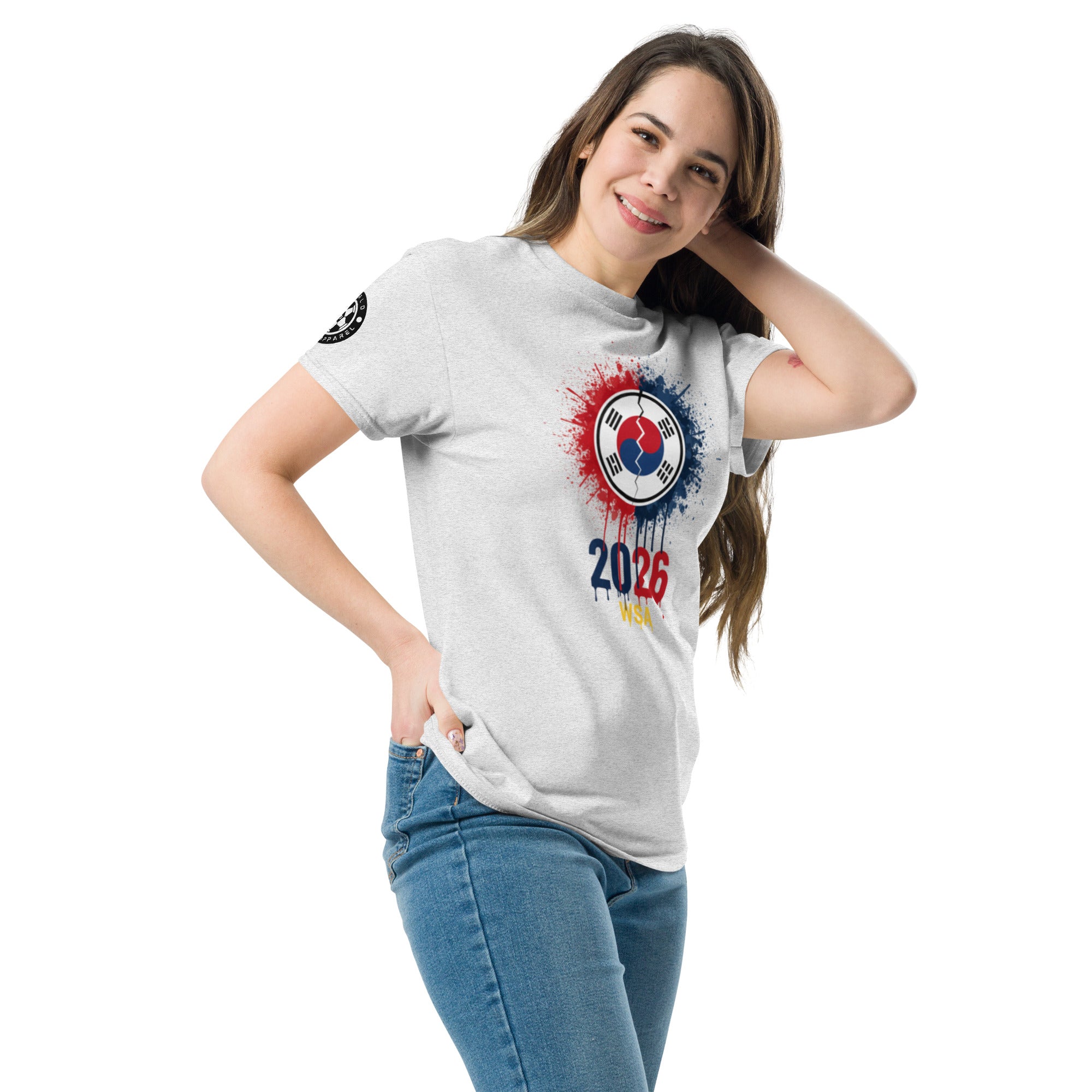 Woman wearing a white t-shirt with a colorful design and '2026' text on a white background