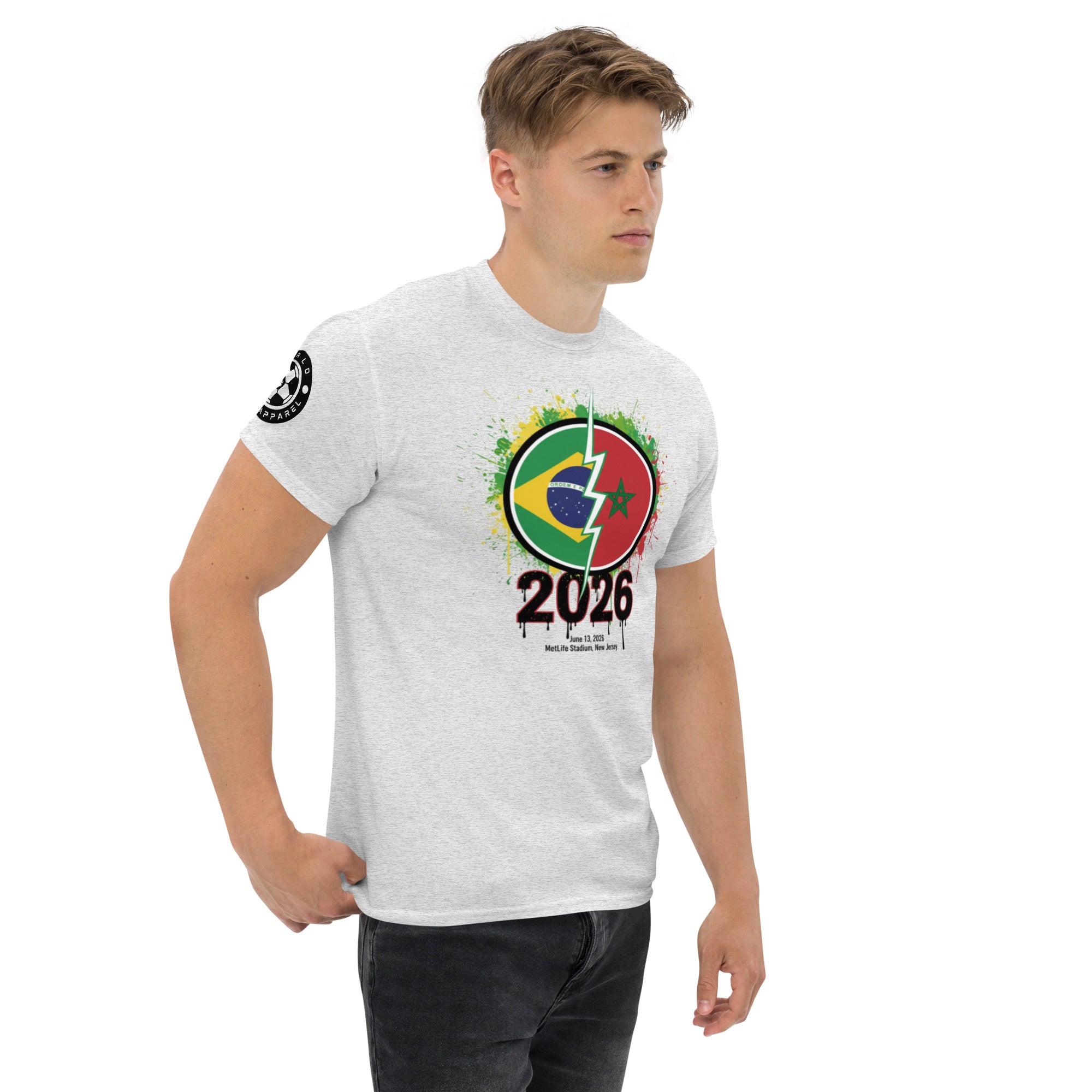 Man wearing a white t-shirt with a colorful design and '2026' text on a white background