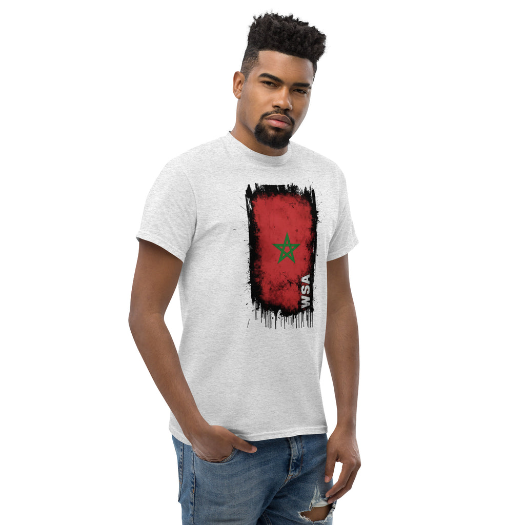 Man wearing a white t-shirt with a red and black graphic design on a white background