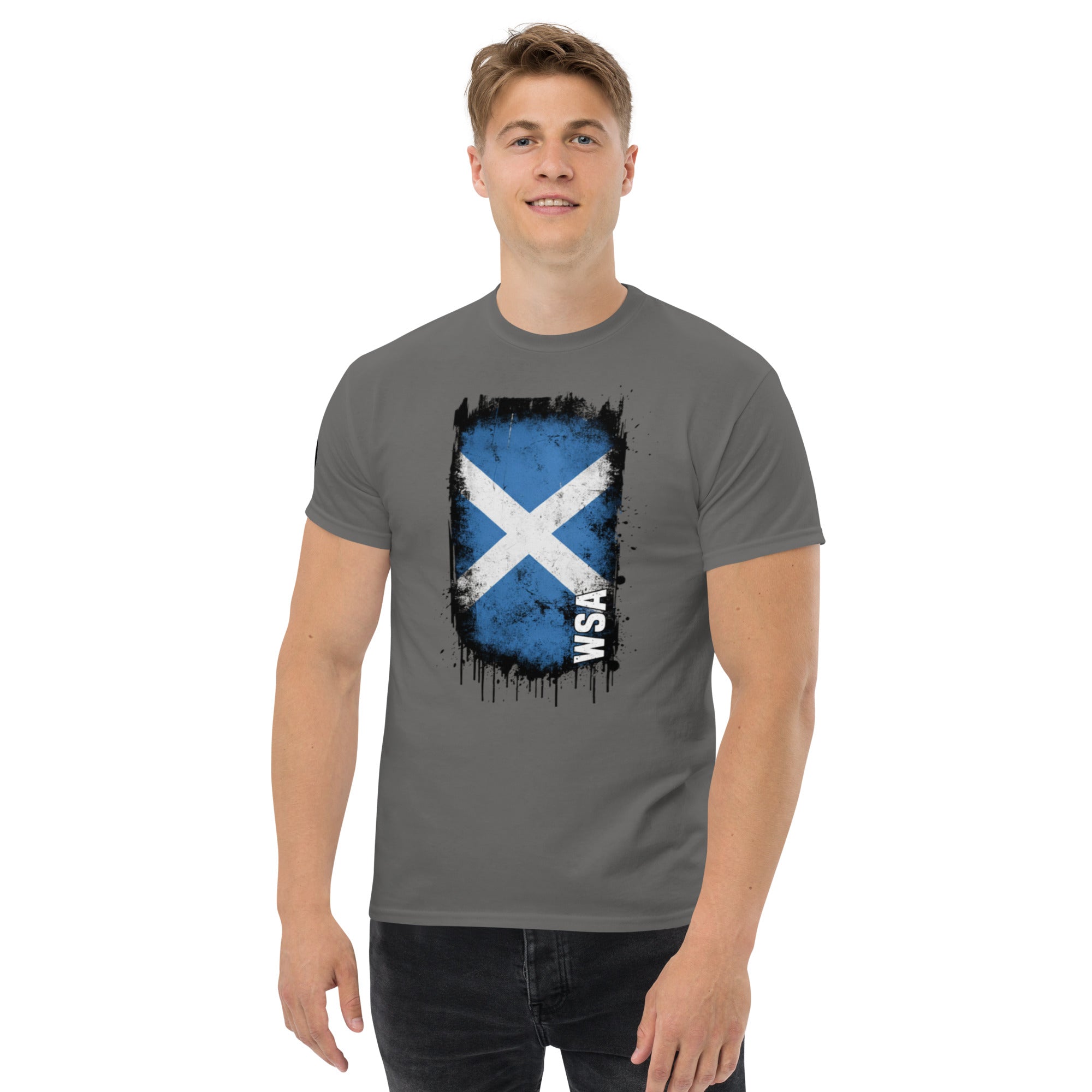 Man wearing a gray t-shirt with a Scottish flag design on a white background