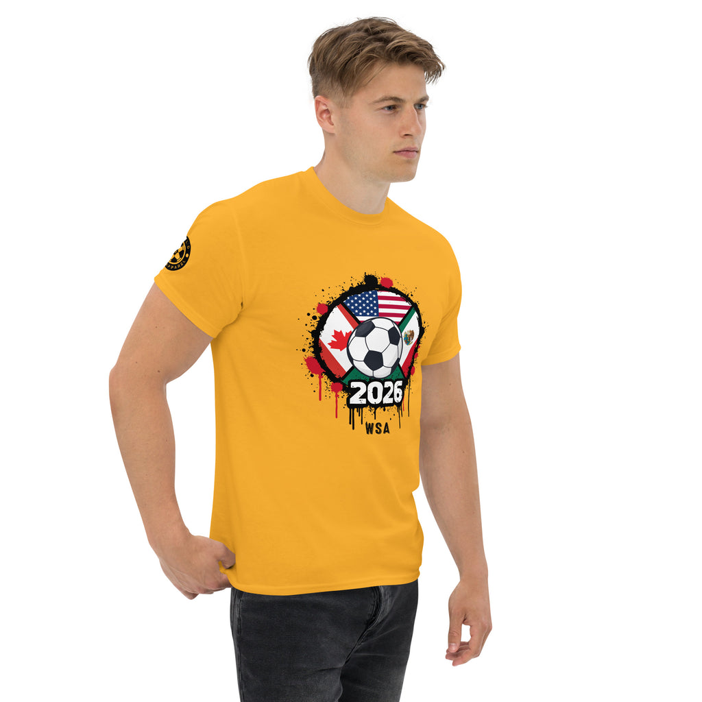 Man wearing a yellow t-shirt with a soccer-themed graphic design on a white background