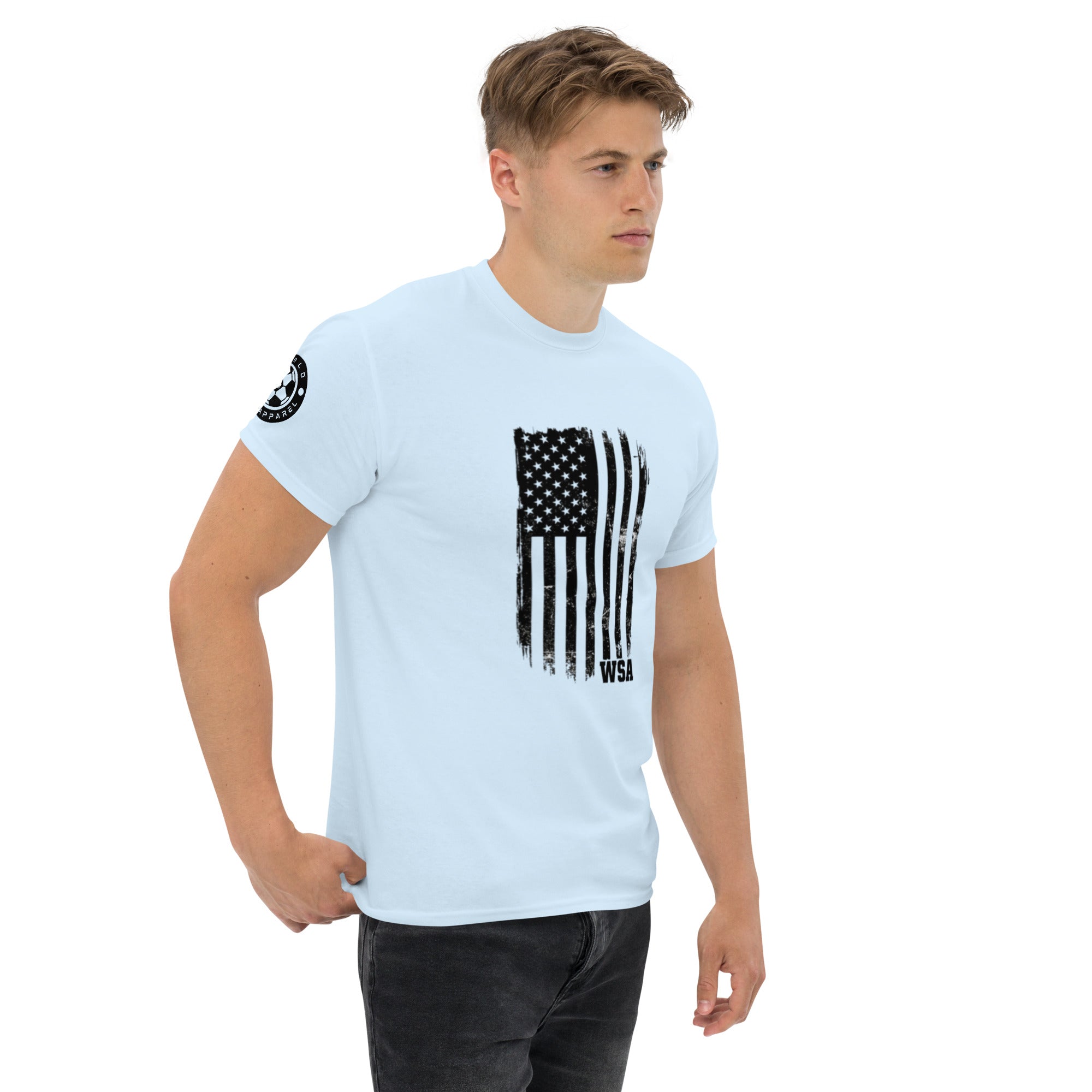 Man wearing a light blue t-shirt with an American flag design on a white background