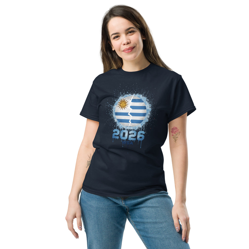 Woman wearing a navy blue t-shirt with a graphic design on a white background