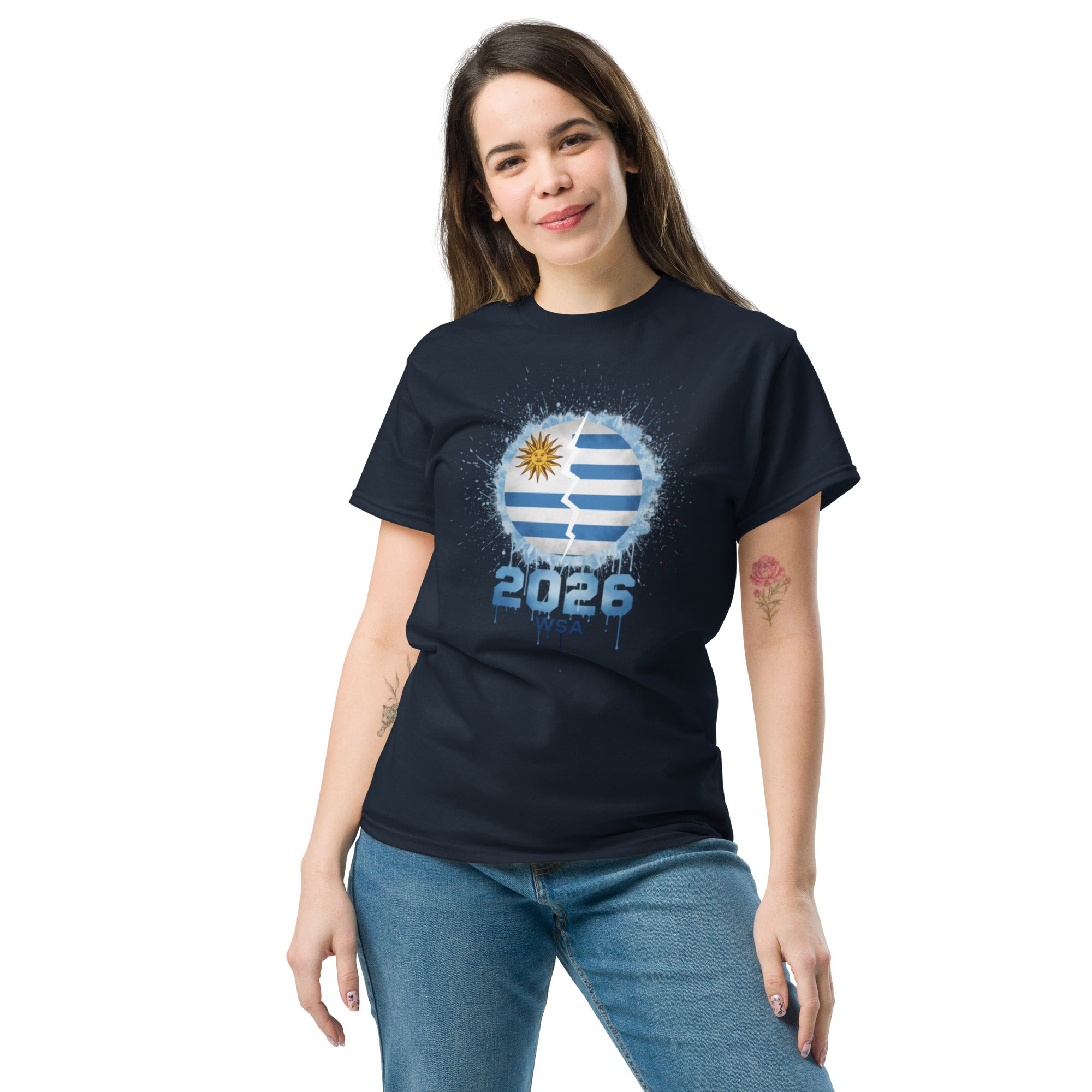 Woman wearing a navy blue t-shirt with a graphic design on a white background