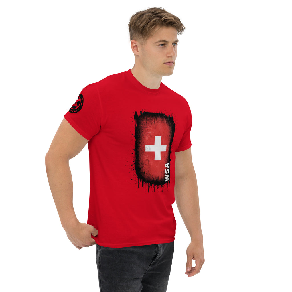 Man wearing a red t-shirt with a graphic design on a white background