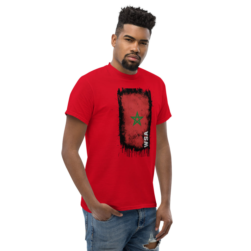 Man wearing a red t-shirt with a graphic design on a white background