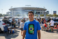 Blue t-shirt with a Brazilian flag design on a white background