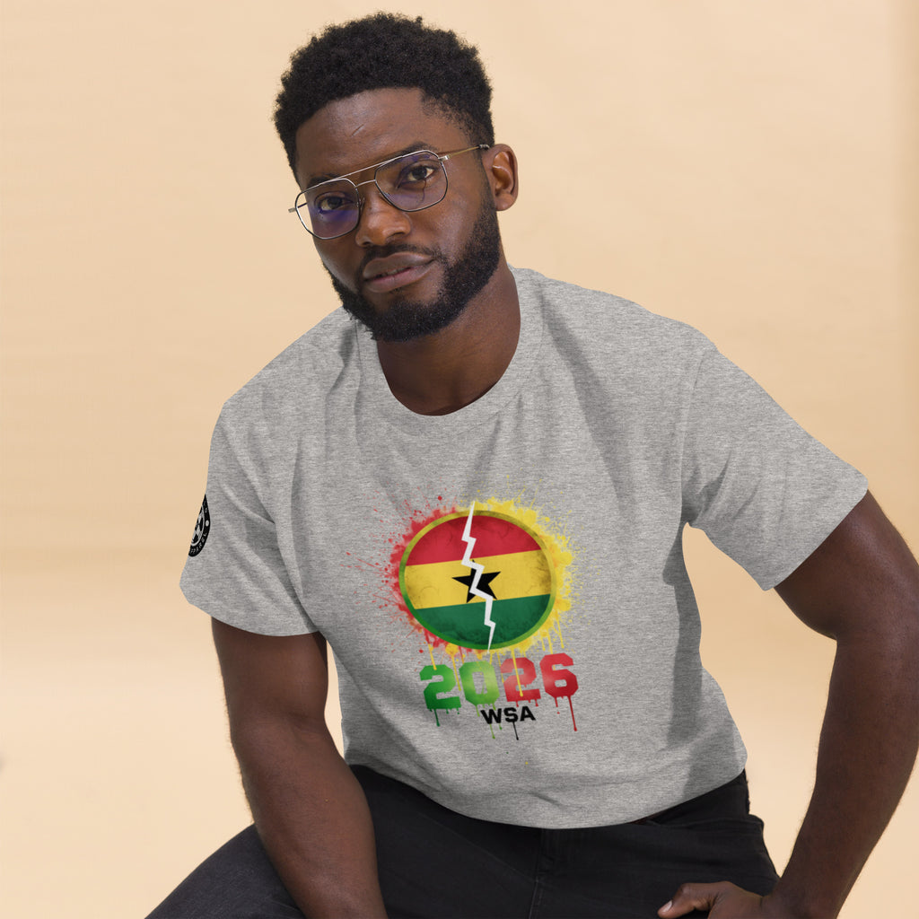 Man wearing a gray t-shirt with a colorful design and text on a beige background