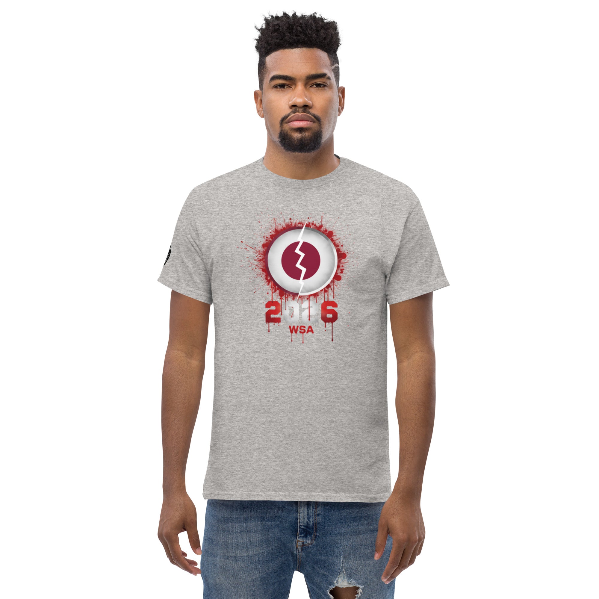 Man wearing a gray t-shirt with a red and white graphic design on a white background