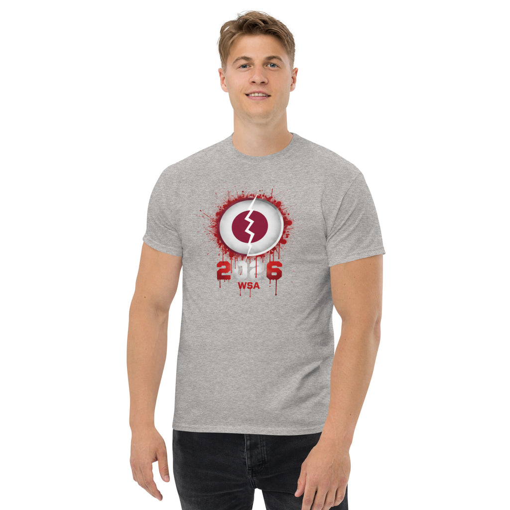 Man wearing a gray t-shirt with a red and white logo on a white background