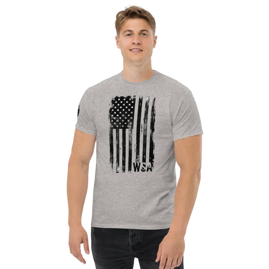 Man wearing a gray t-shirt with an American flag design on a white background