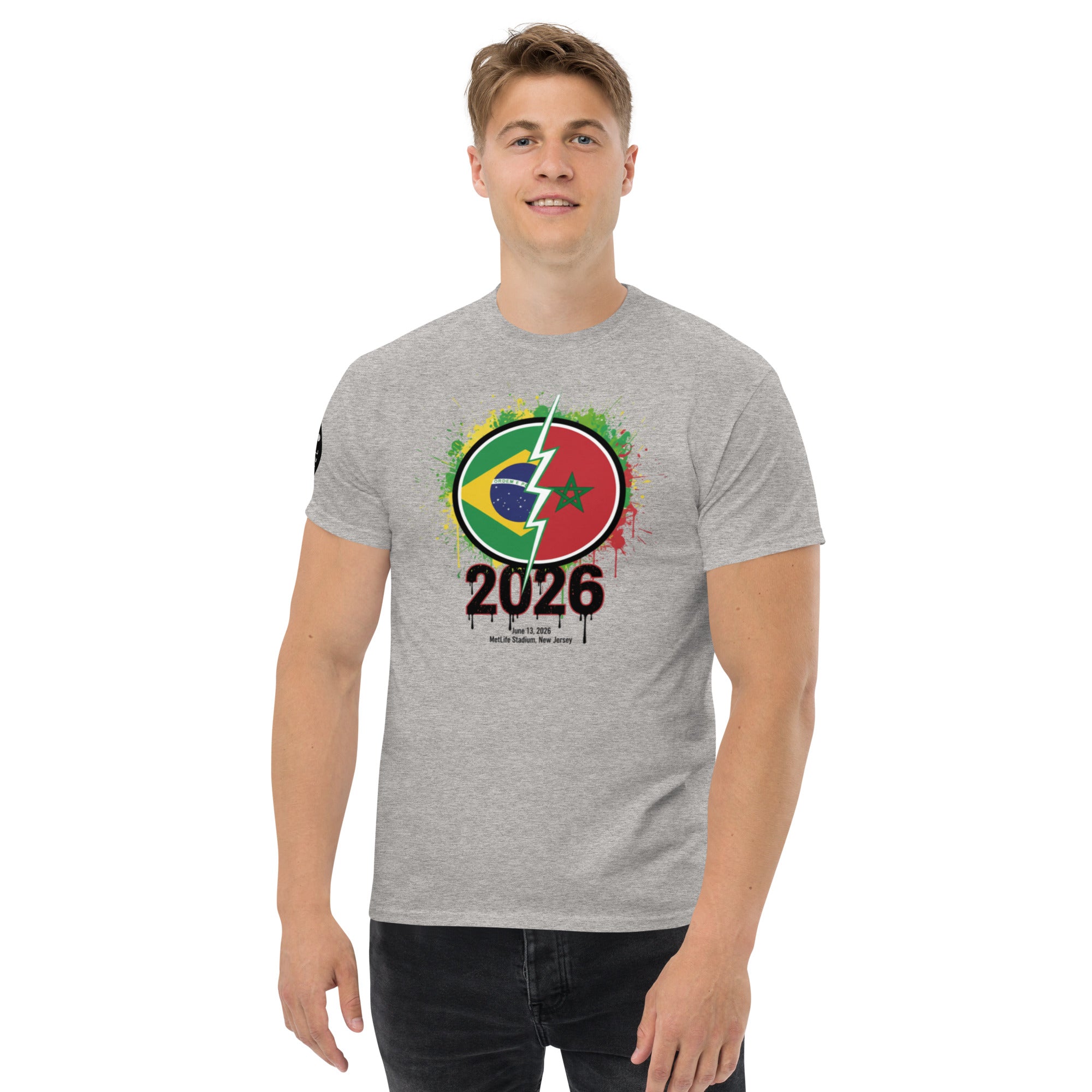 Person wearing a gray t-shirt with a colorful design and '2026' text on a white background