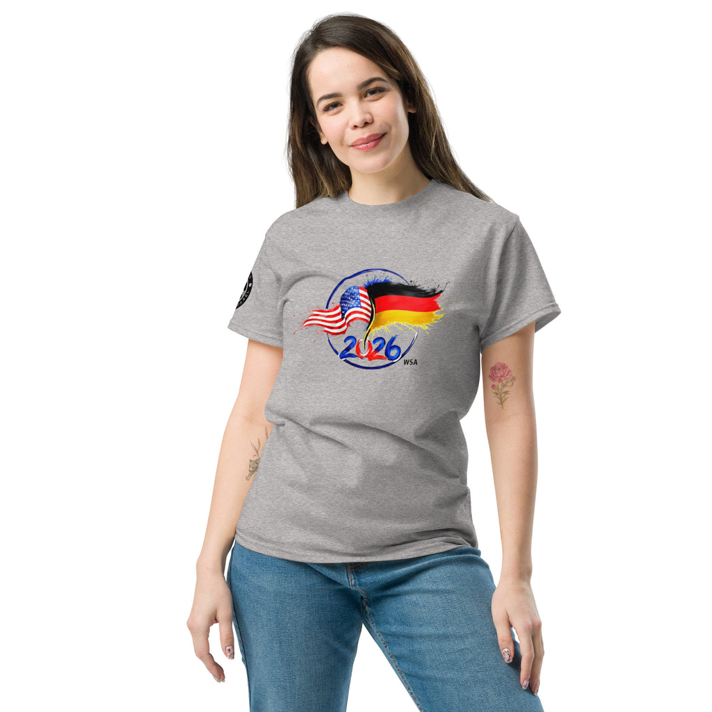 Woman wearing a gray t-shirt with a colorful graphic design on a white background