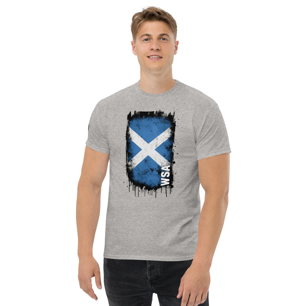 Man wearing a gray t-shirt with a Scottish flag design on a white background