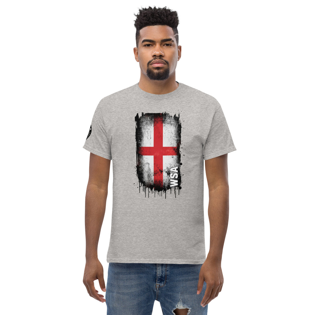 Man wearing a gray t-shirt with a graphic design on a white background