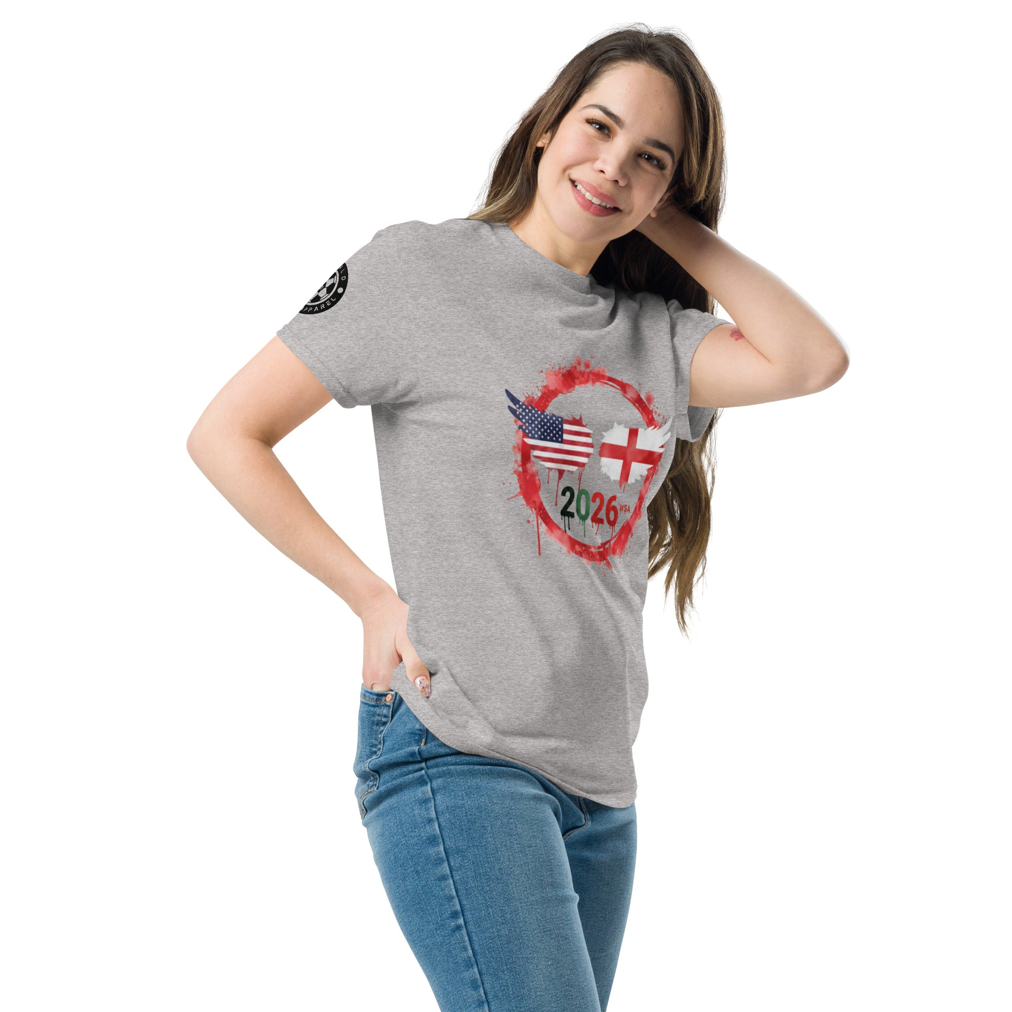 Woman wearing a gray t-shirt with a graphic design on a white background