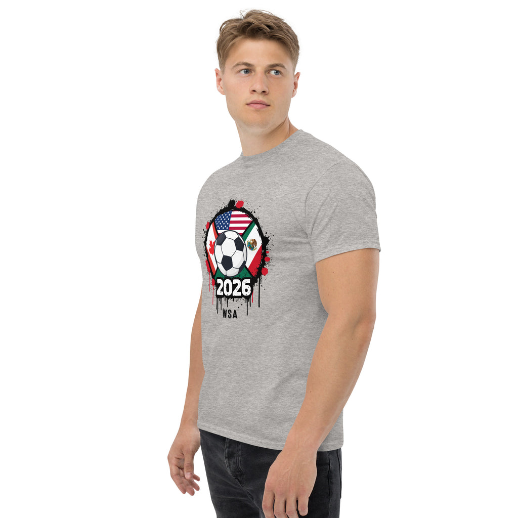 Man wearing a gray t-shirt with a soccer-themed design on a white background