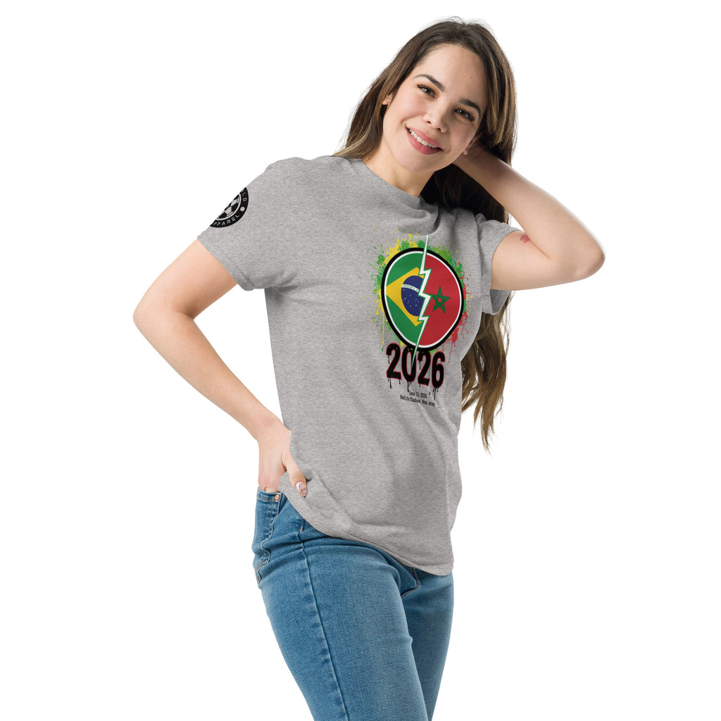 Woman wearing a gray t-shirt with a colorful logo and '2026' text on a white background