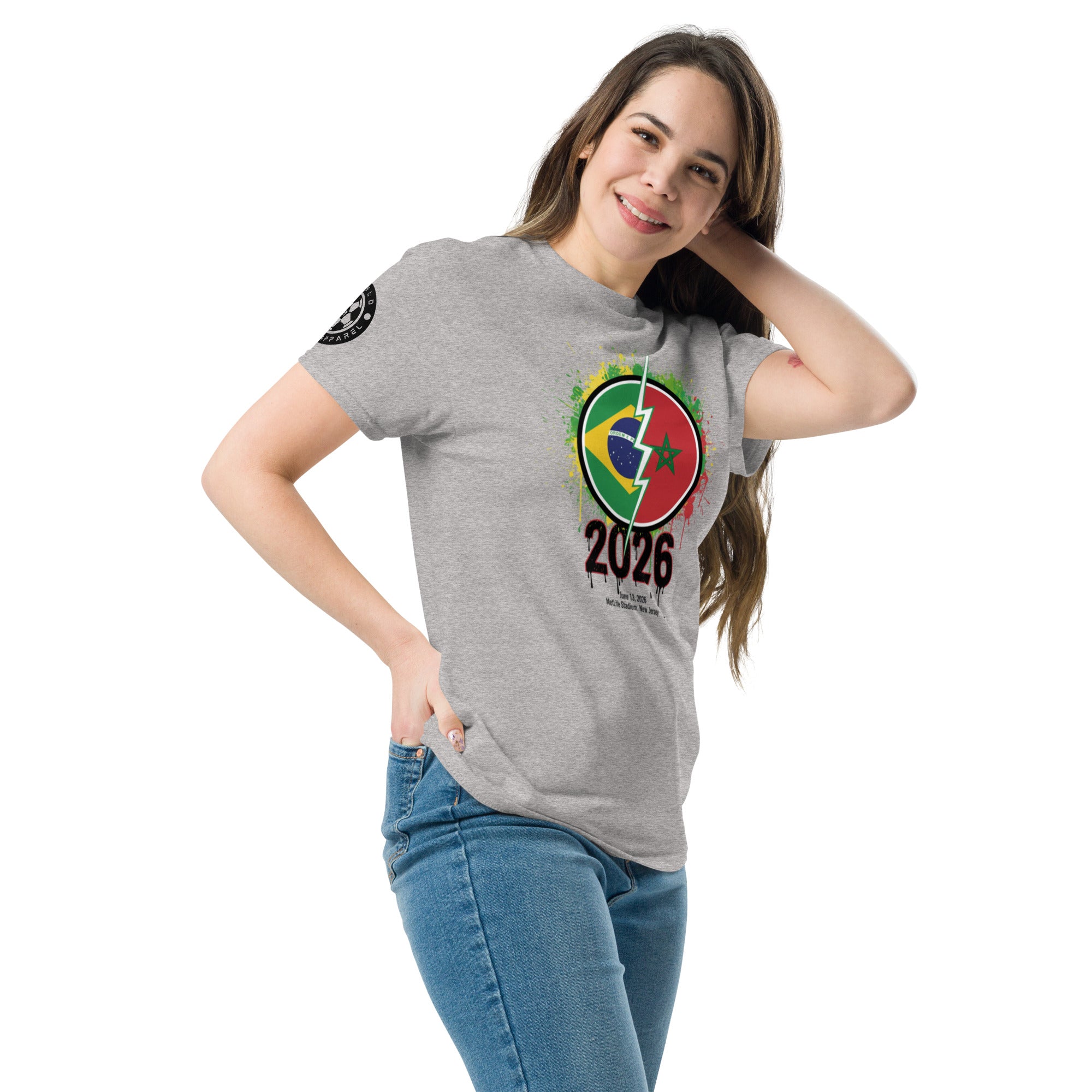 Woman wearing a gray t-shirt with a colorful logo and '2026' text on a white background