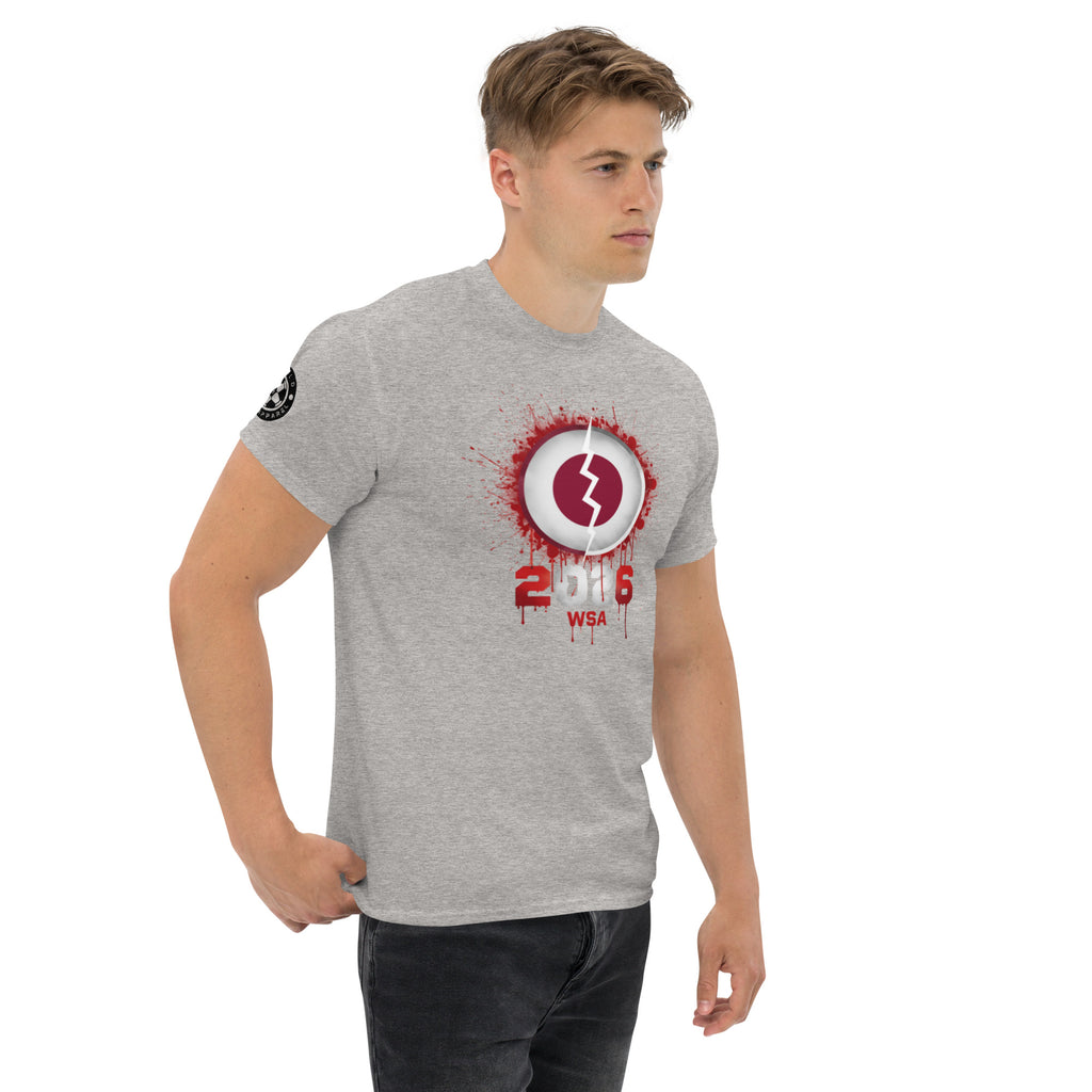 Man wearing a gray t-shirt with a red and white logo on a white background