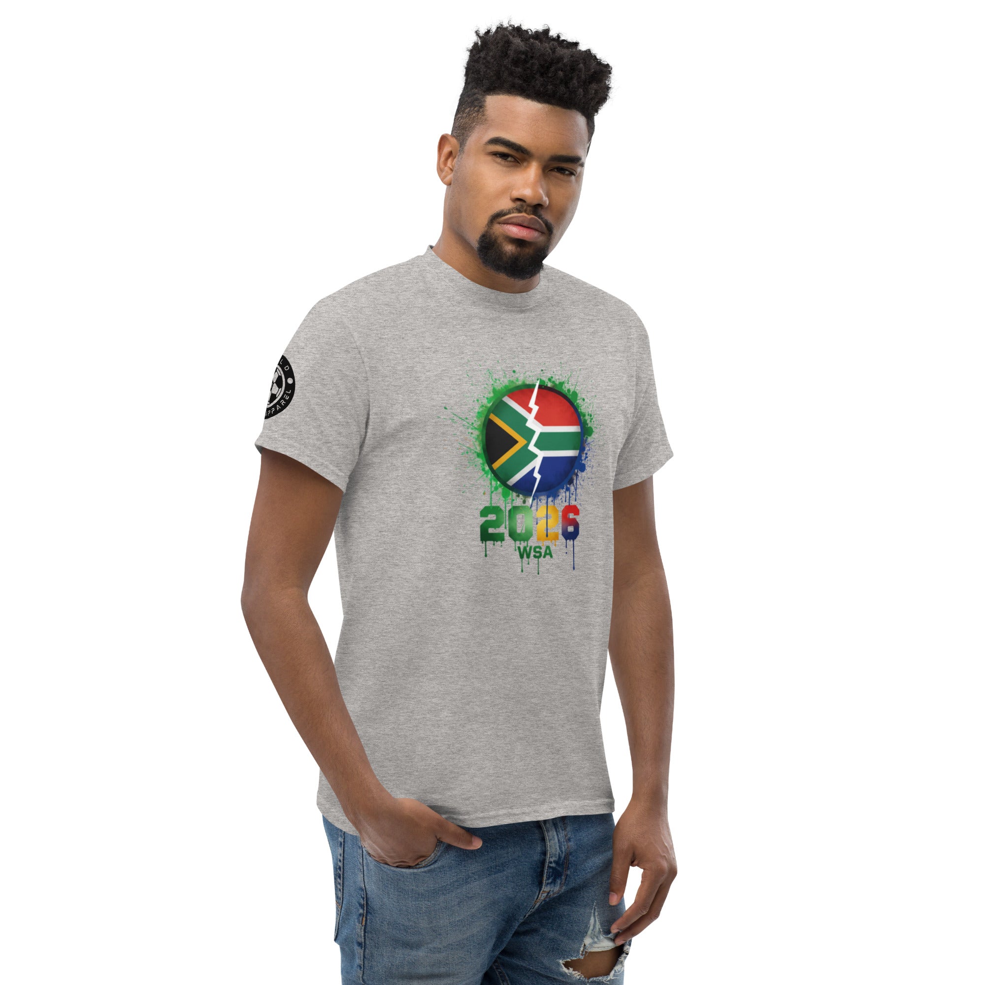 Man wearing a gray t-shirt with a colorful graphic design on a white background