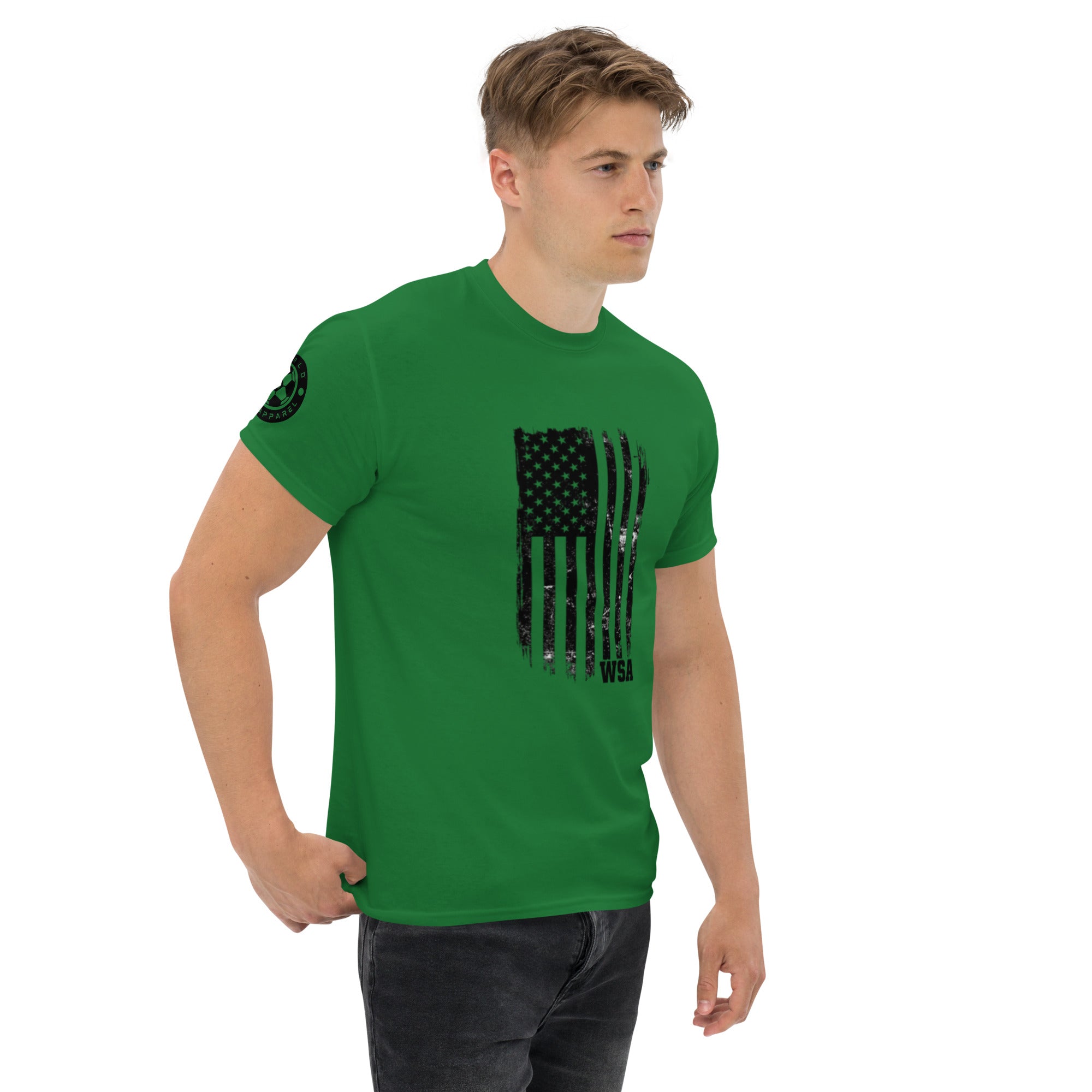 Man wearing a green t-shirt with a black flag design on a white background