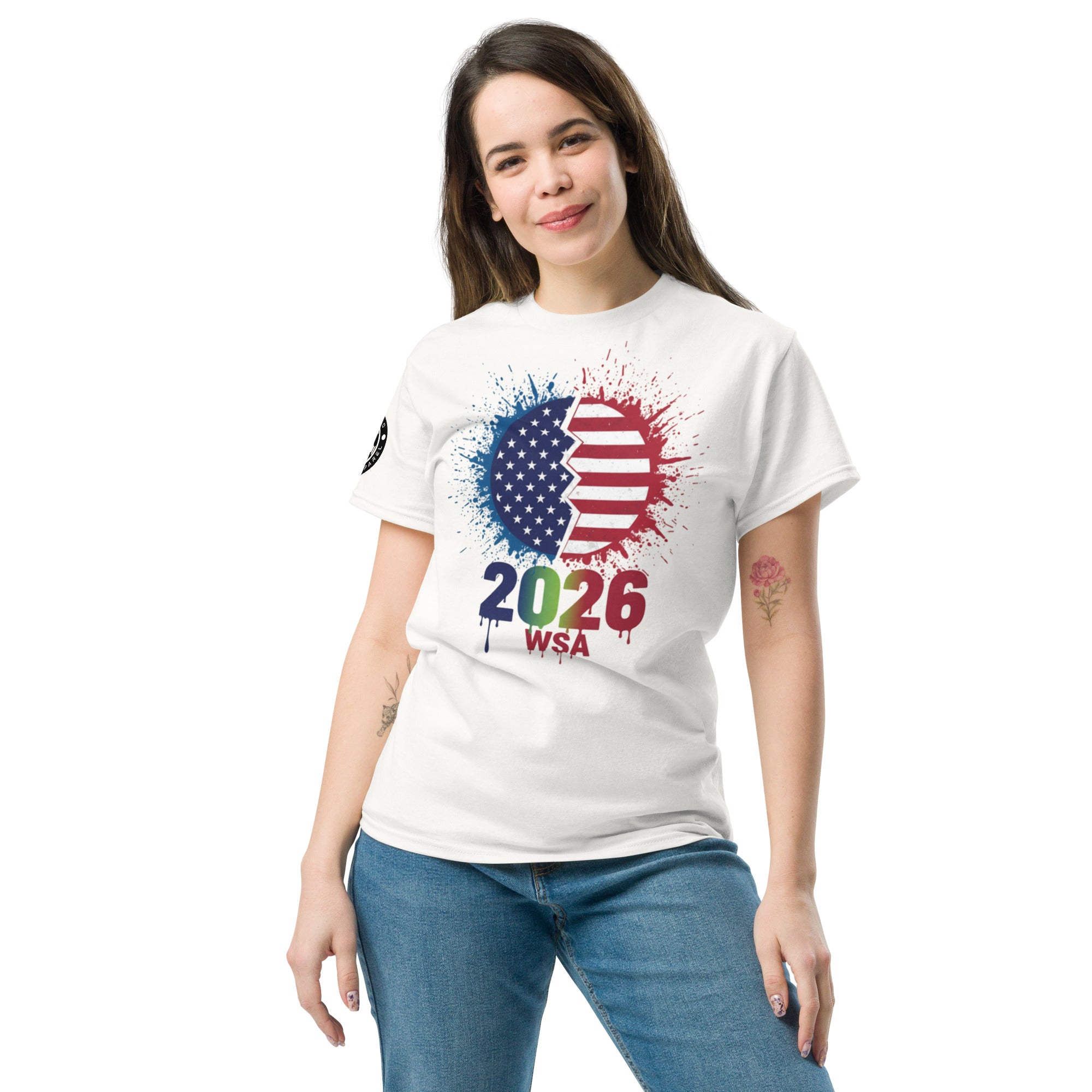 Woman wearing a white t-shirt with a colorful design featuring '2026 WSA' on a white background