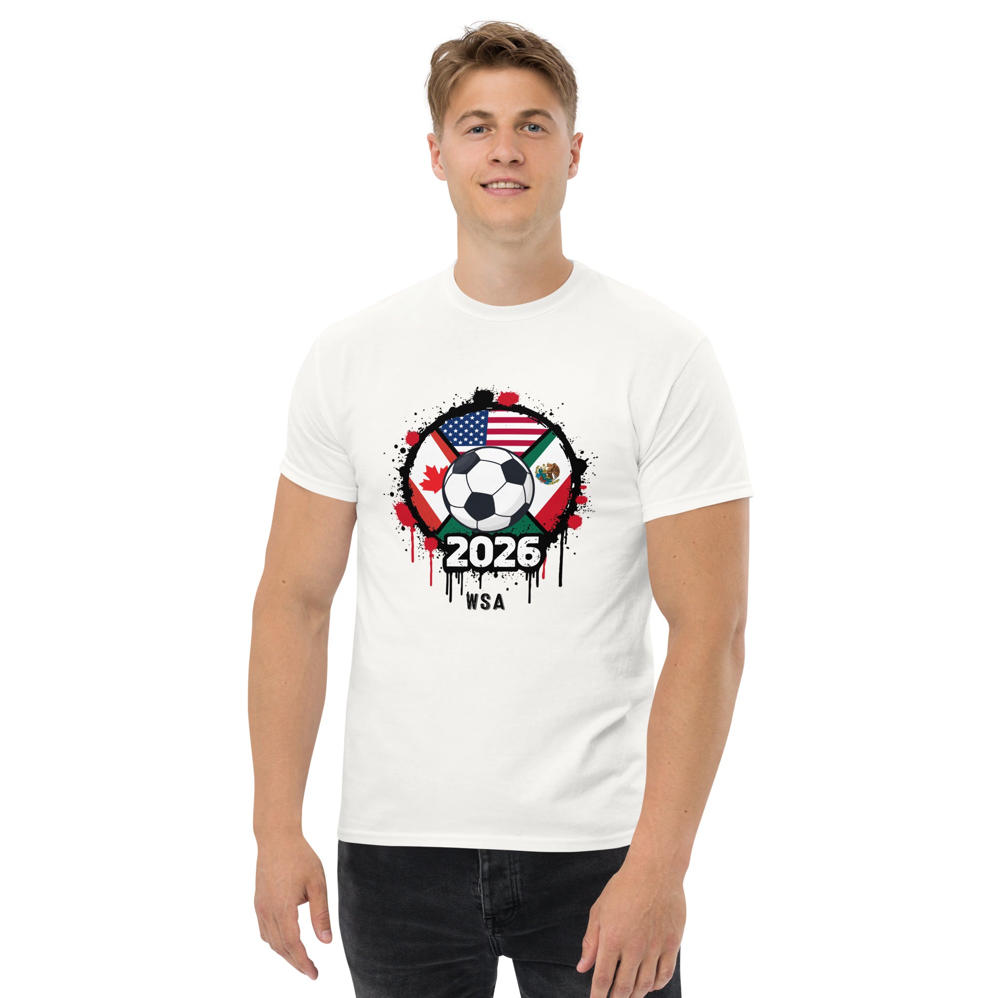 Person wearing a white t-shirt with a soccer-themed design featuring flags and '2026' text.