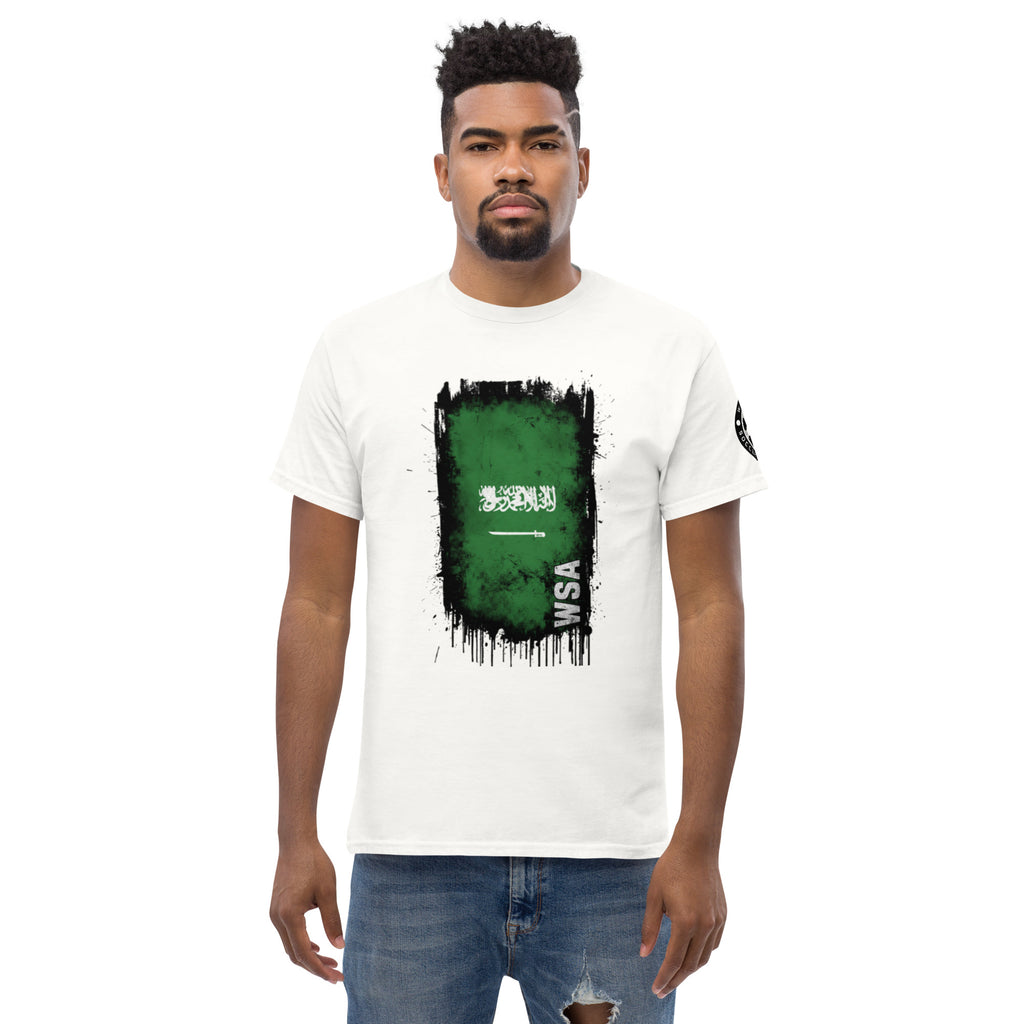 Man wearing a white t-shirt with a green and black graphic design on a white background