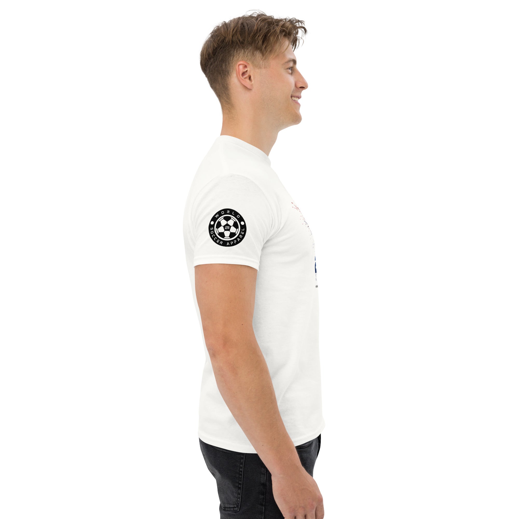 Man wearing a white t-shirt with a black circular logo on a white background