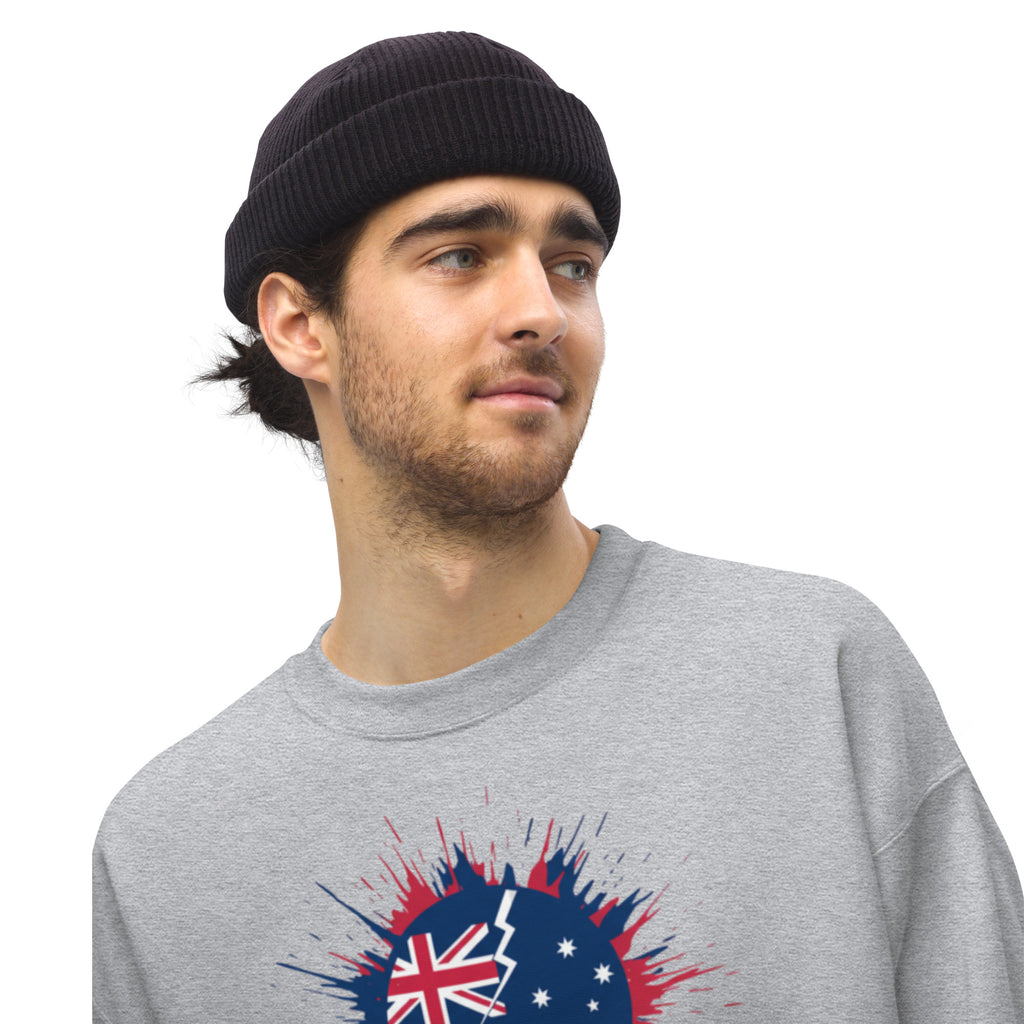 Man wearing a gray sweatshirt with a graphic design on a white background