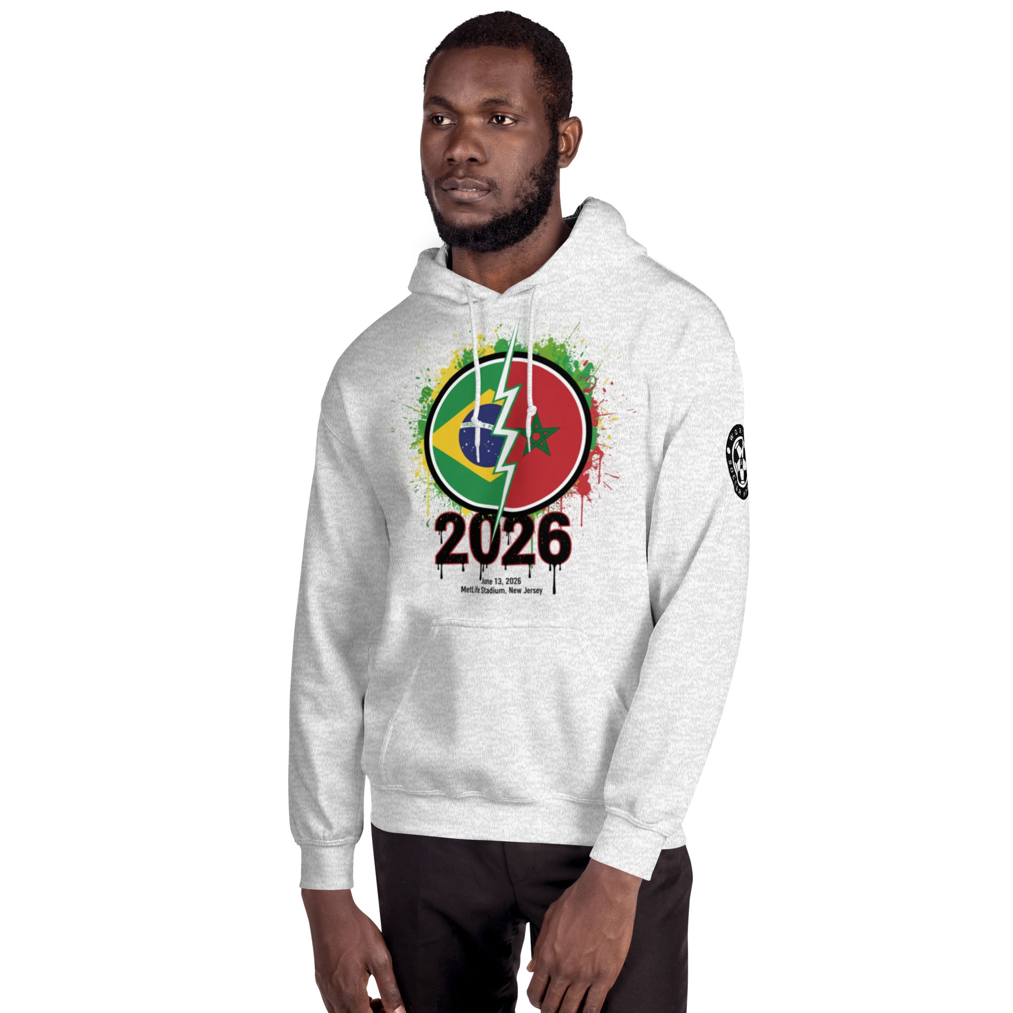 Man wearing a white hoodie with a colorful design and '2026' text on a white background
