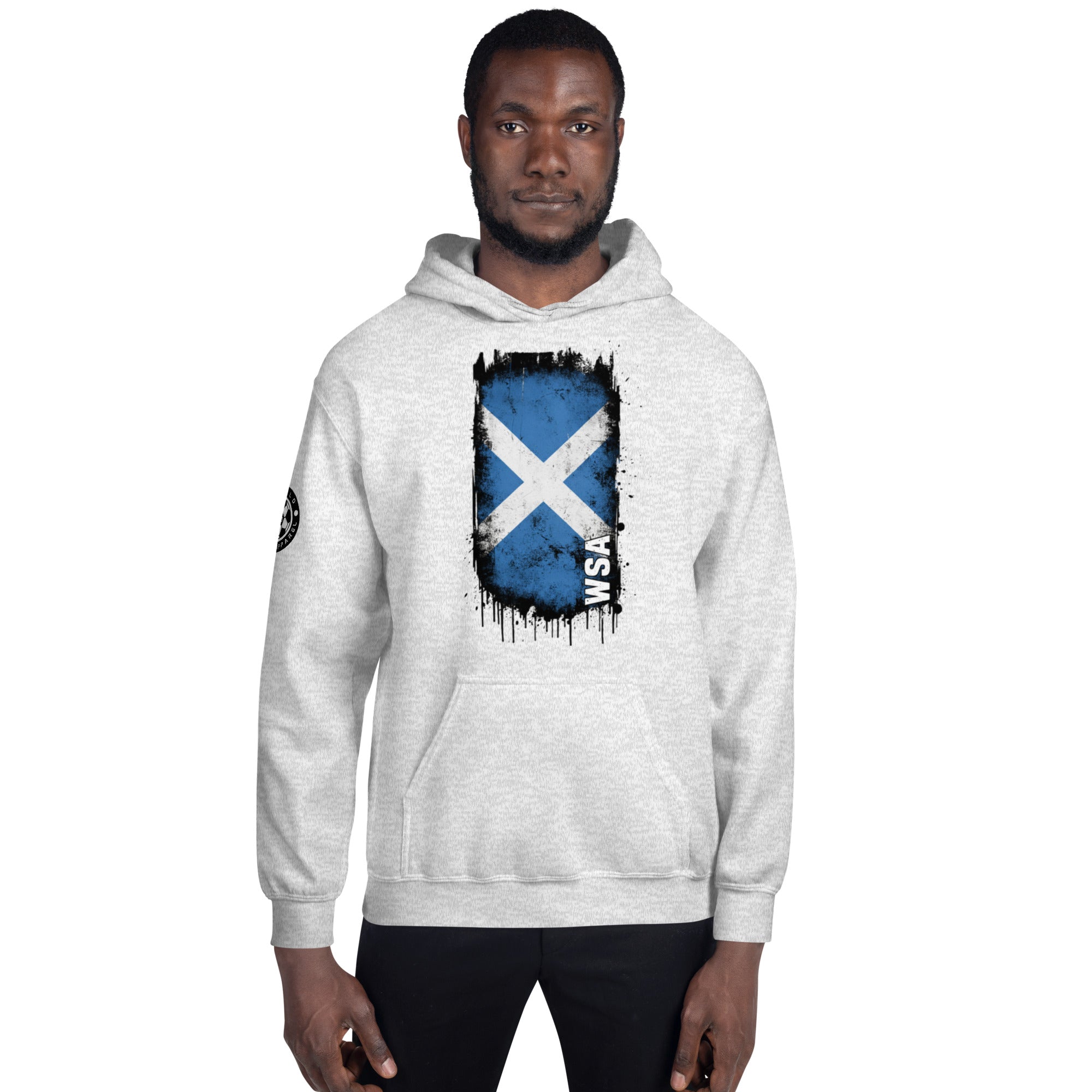 Person wearing a white hoodie with a Scottish flag design on a white background