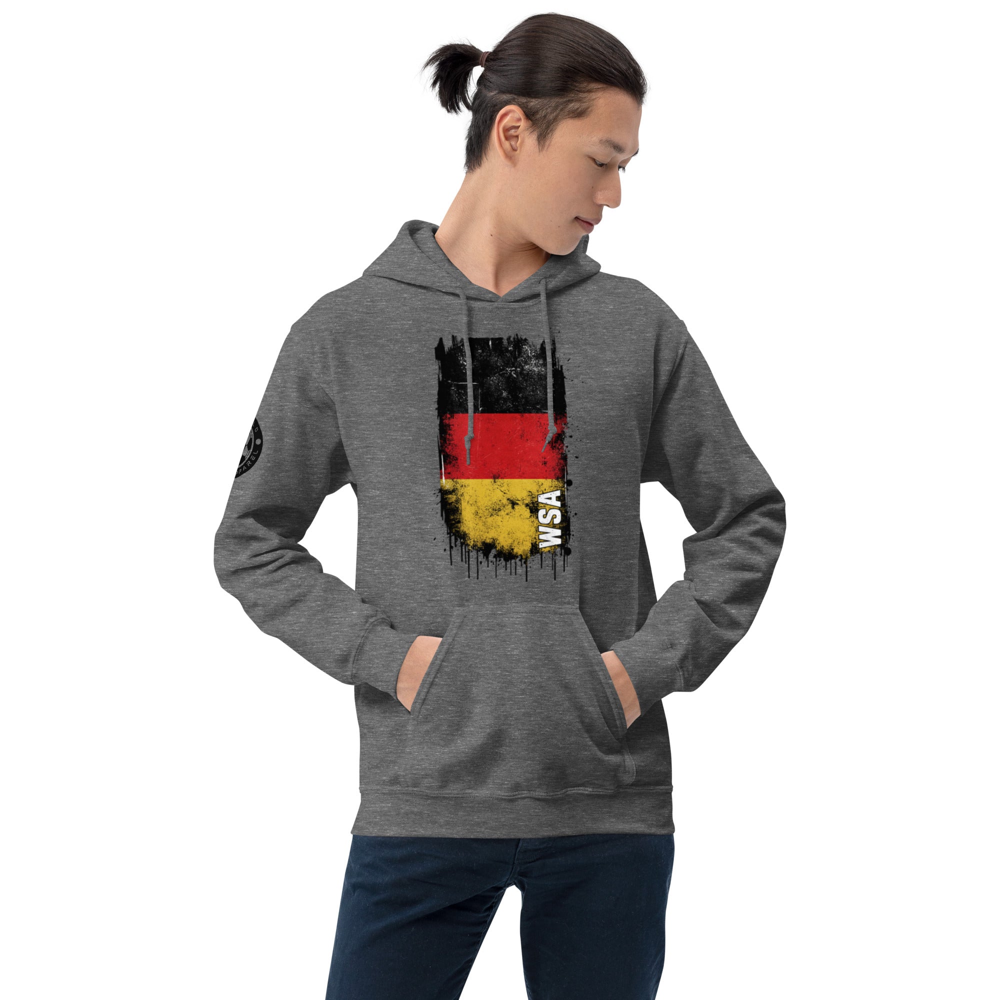 Person wearing a gray hoodie with a graphic design on a white background