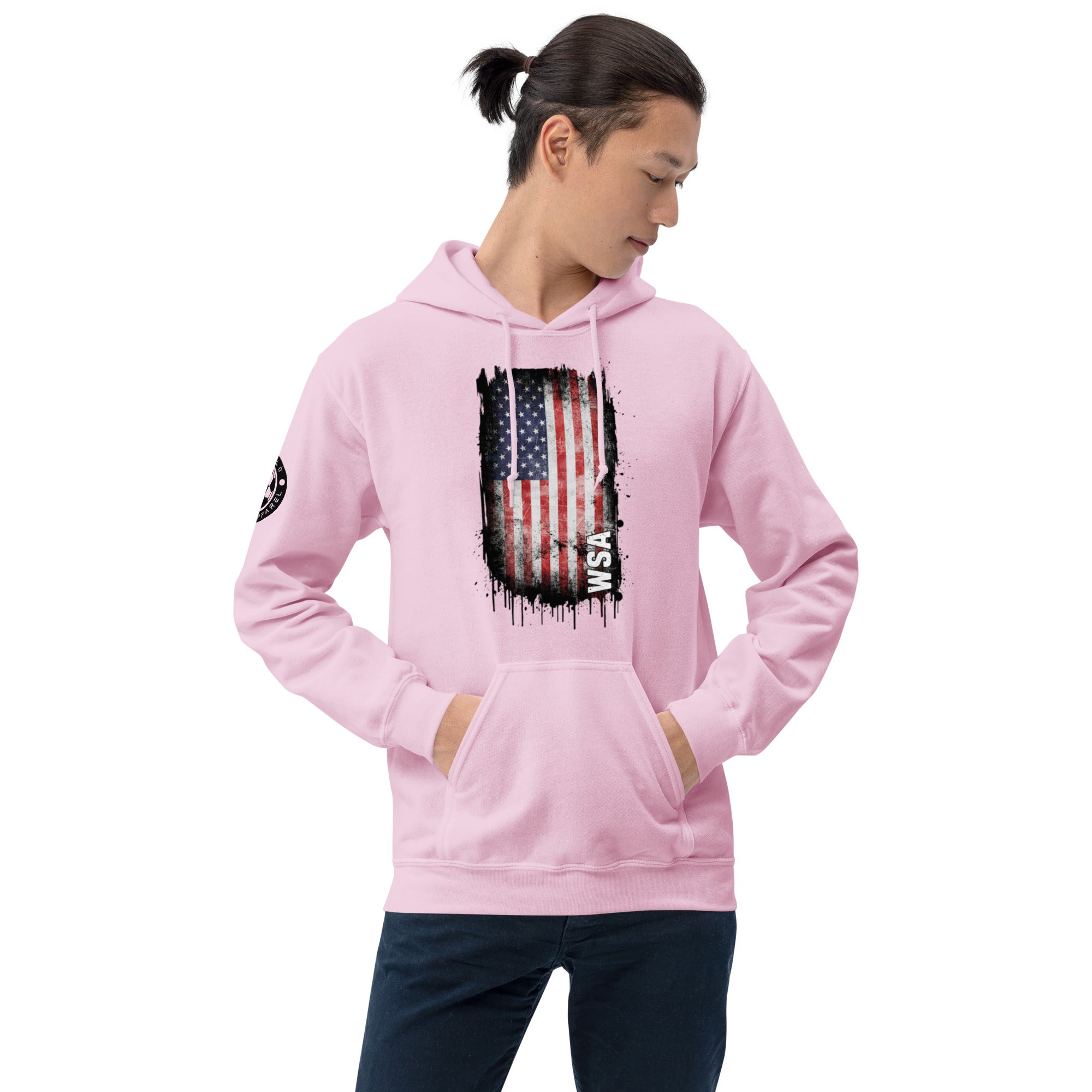 Person wearing a pink hoodie with an American flag design on a white background