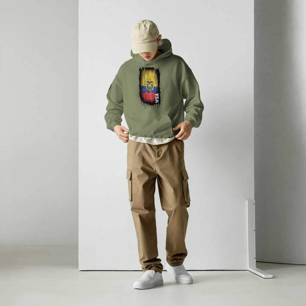 Person wearing a green hoodie with a colorful graphic and brown cargo pants against a white background