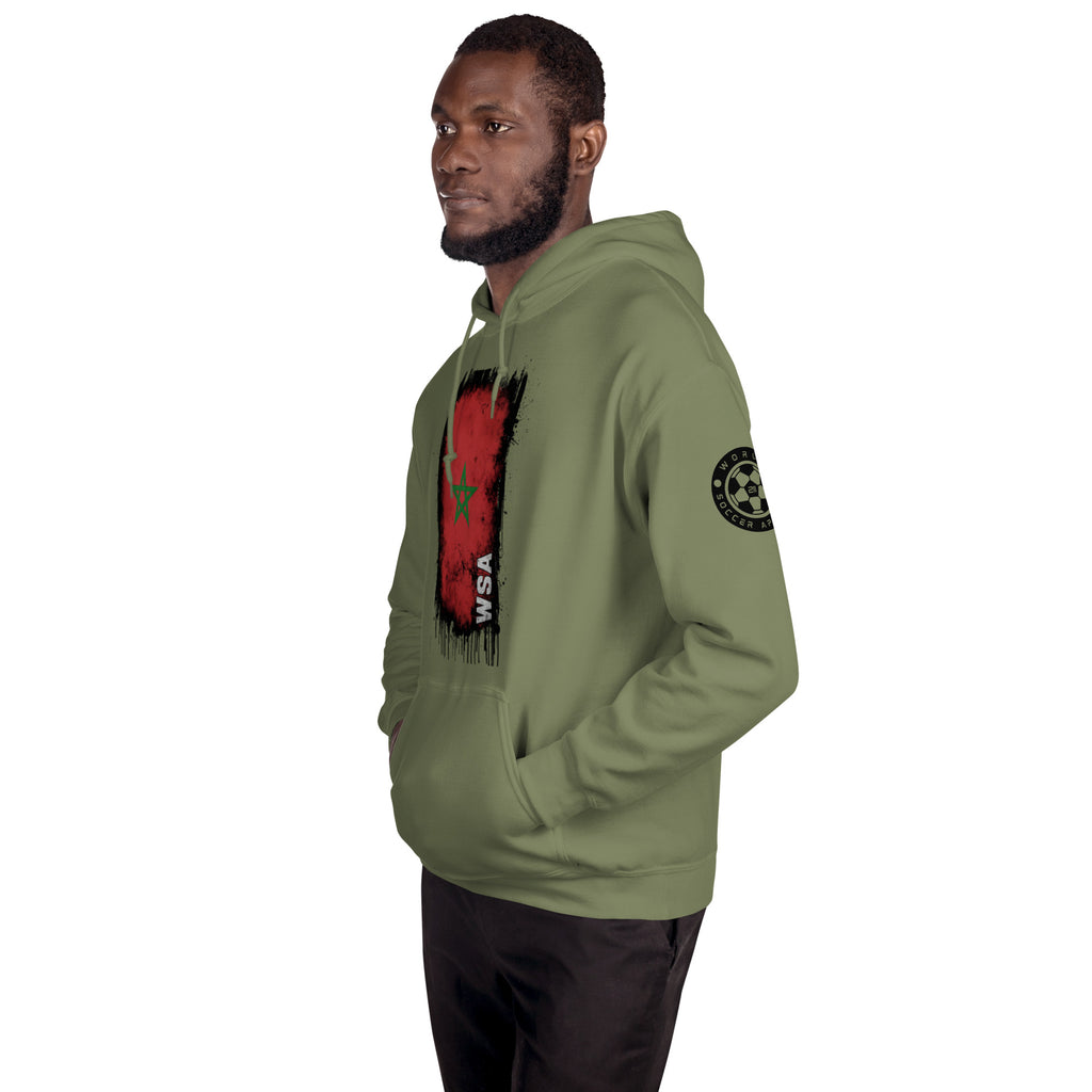 Man wearing a green hoodie with a red and black design on a white background