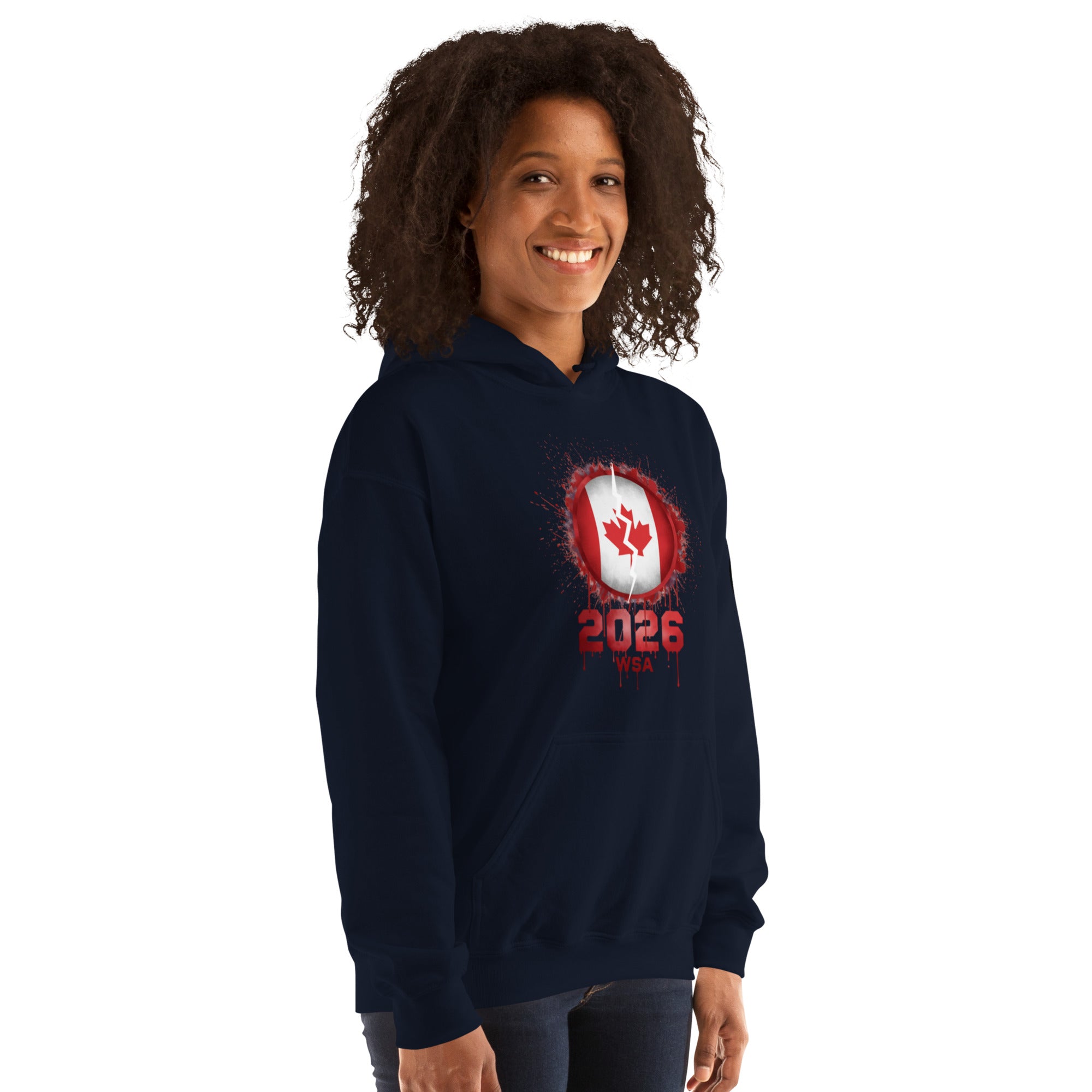 Person wearing a navy hoodie with a red and white design and '2026' text on a white background