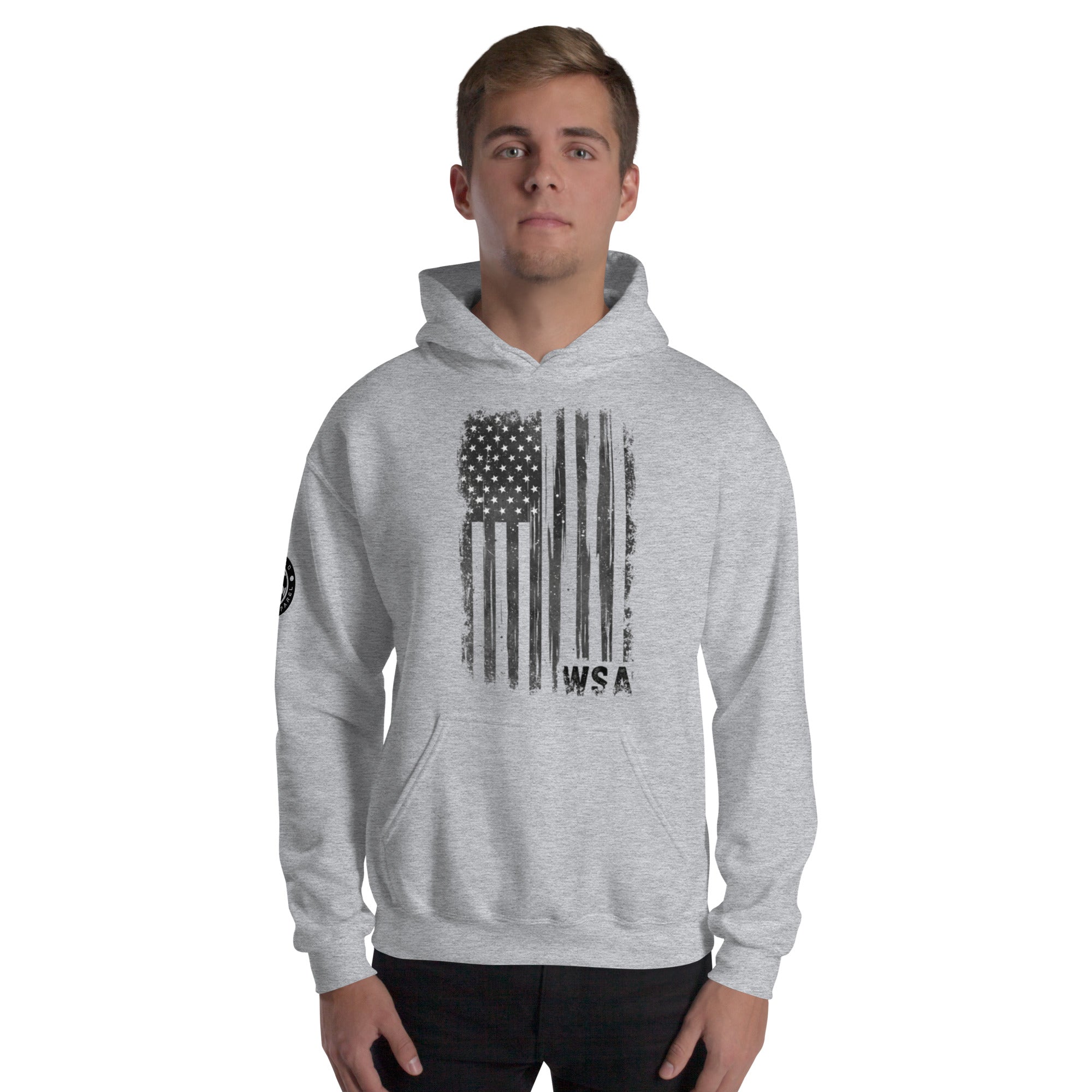 Person wearing a gray hoodie with an American flag design on a white background