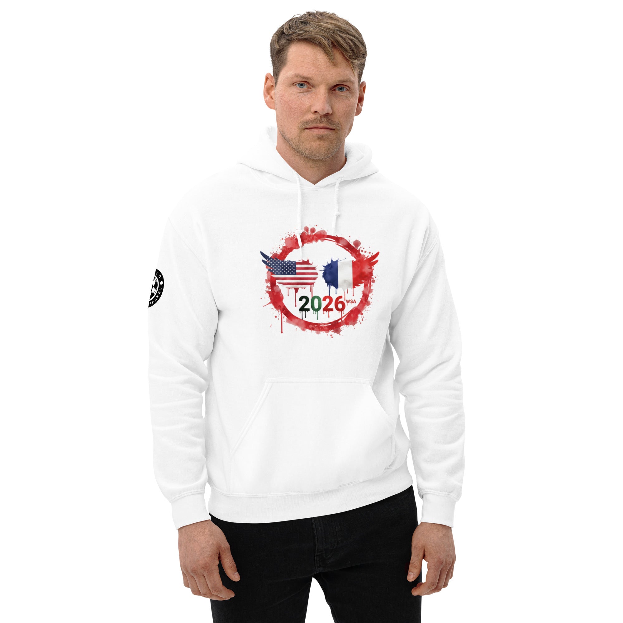 Man wearing a white hoodie with a design featuring the number 2026 and two flags on a white background