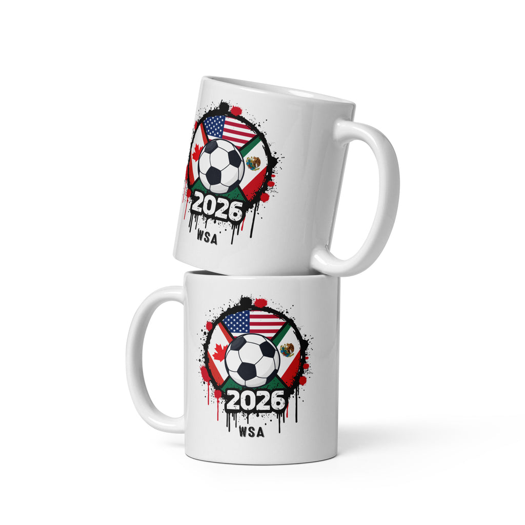 Two white mugs with soccer ball design featuring flags and '2026 WSA' text on a white background.