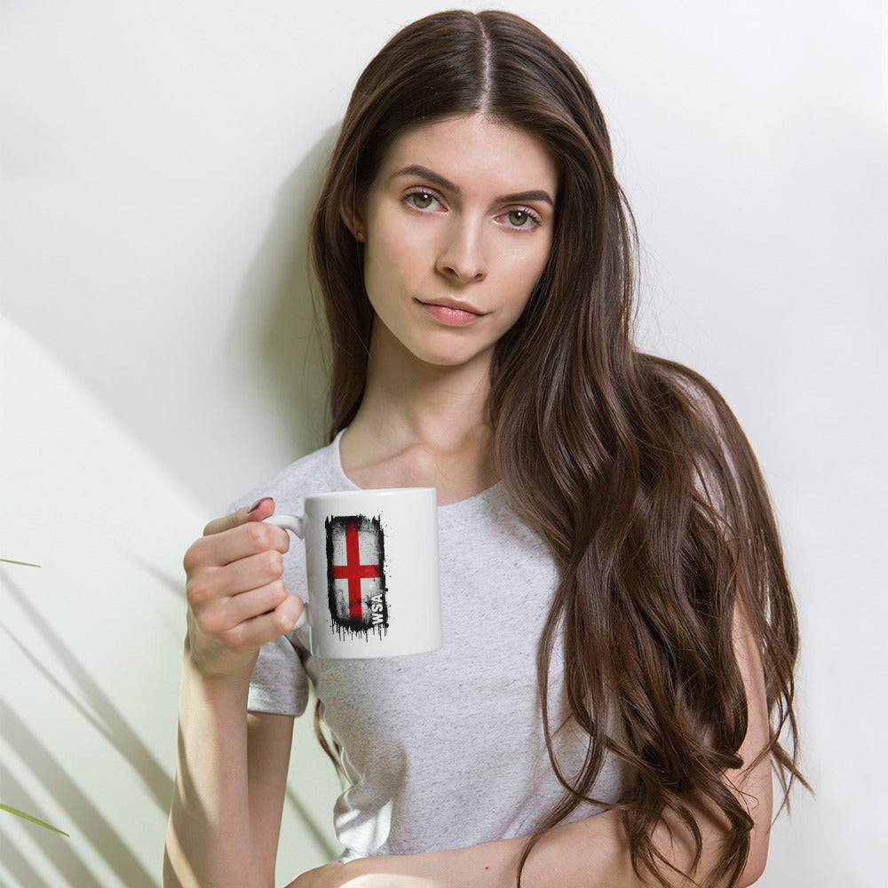 Woman holding a mug with a design on a white background